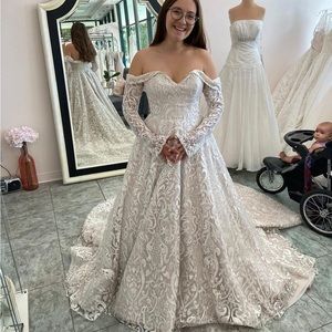 Elegant white off the shoulder wedding gown